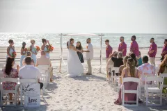 A joyful bridal party celebration near Sarasota area, perfect for a beach wedding on a secluded island.
