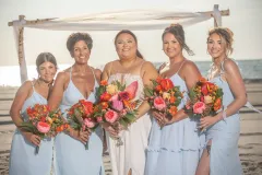 Capture the unity of bridesmaids at a beach wedding on an exclusive private island near Sarasota FL.