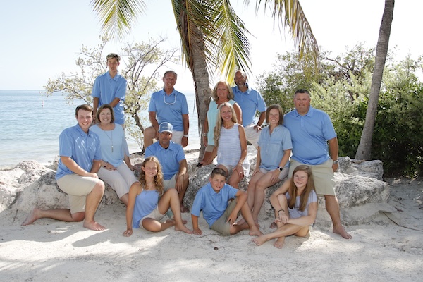 Family reunion at Palm Island Resort with a picturesque Florida beach backdrop.