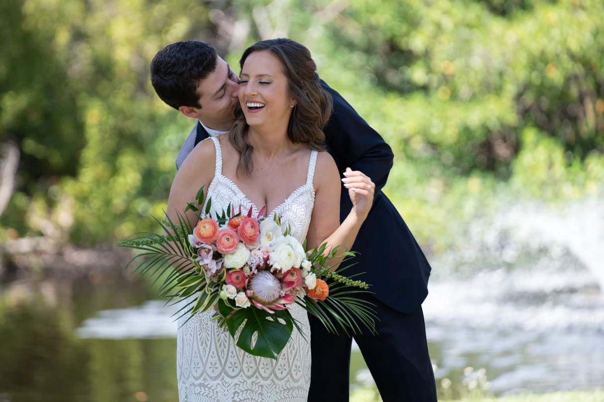 Groom kissing bride on a private island near Sarasota area